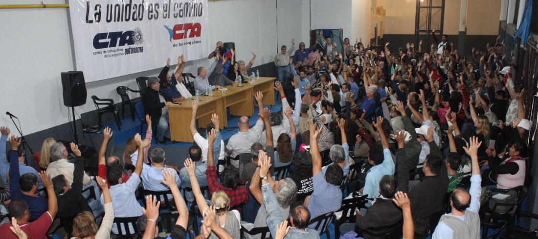 Workers' Central Union (CTA) members raising hands in support of April 30 strike (source httpwww.cta.org.ar)